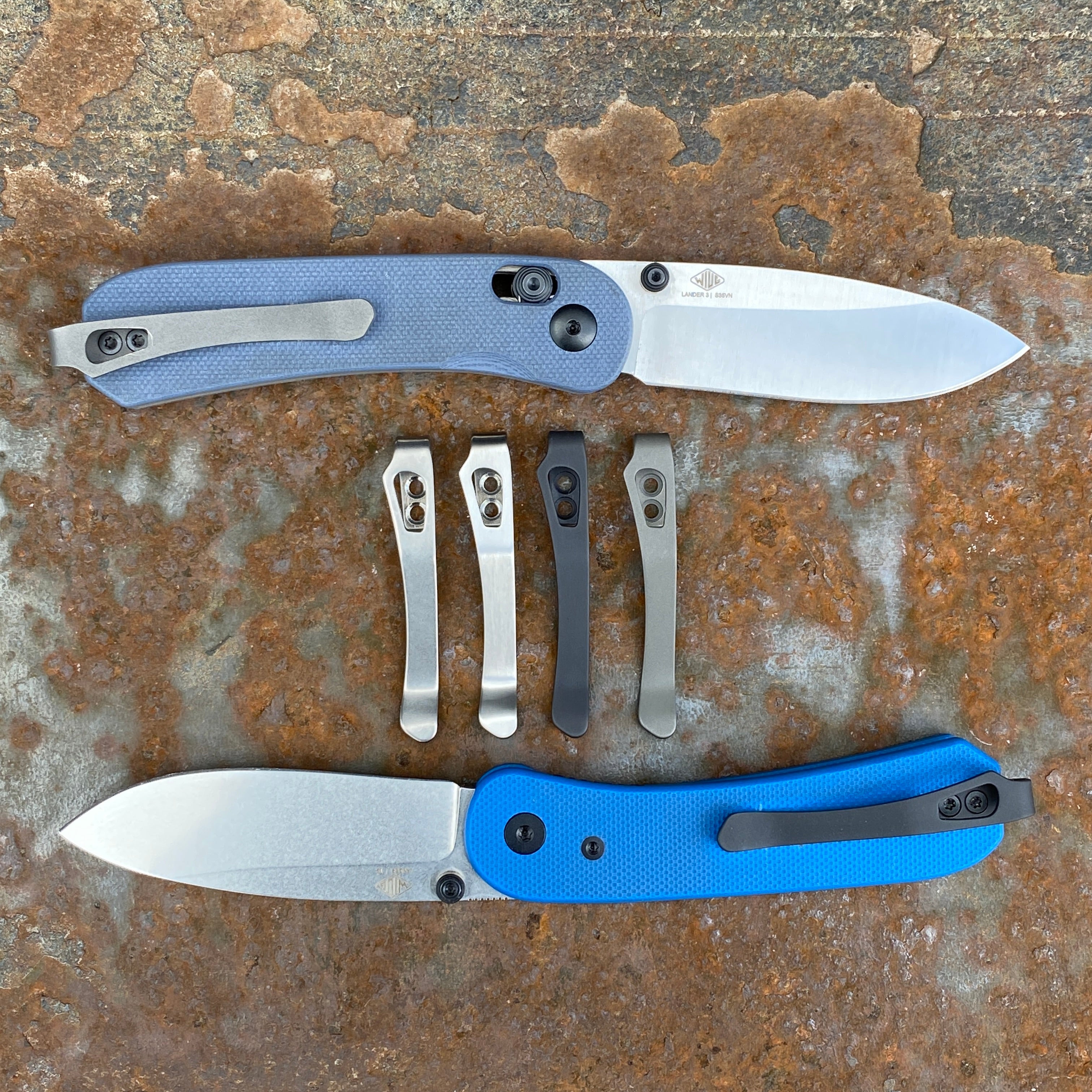 Lander 1/2/3 Titanium Pocket Clip - Black Smith - Lynch NW - lifestyle 4 clips and two on the knives. 