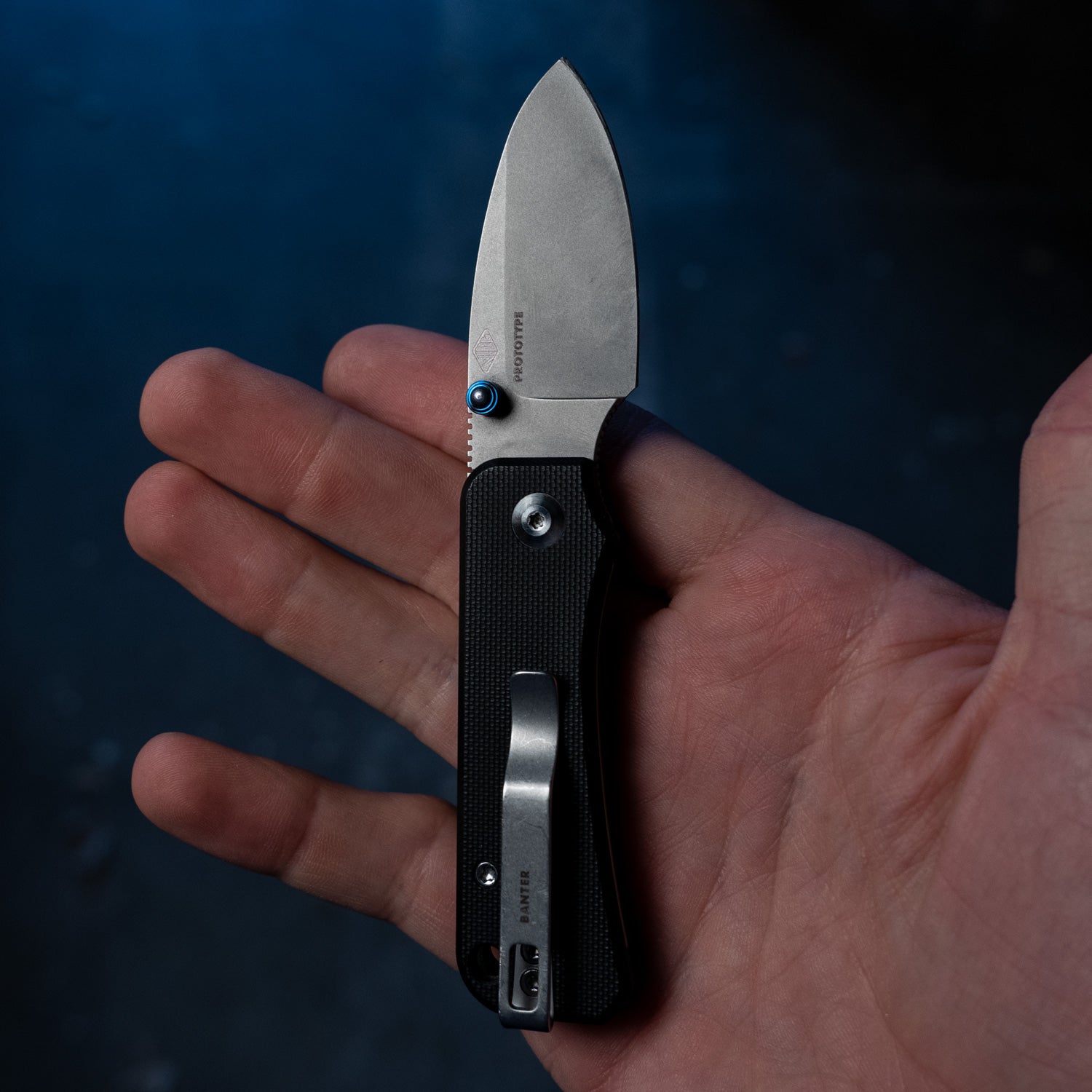 Baby Banter Pocket Knife - Black G10 - Gray Stonewash Nitro V - open back in hand